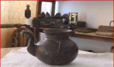 Items of old household utensils Riddle from top to bottom narrow top wide not pan